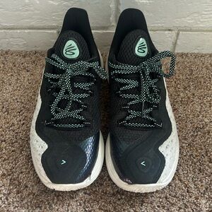 Under Armor Curry basketball shoes, youth size 7